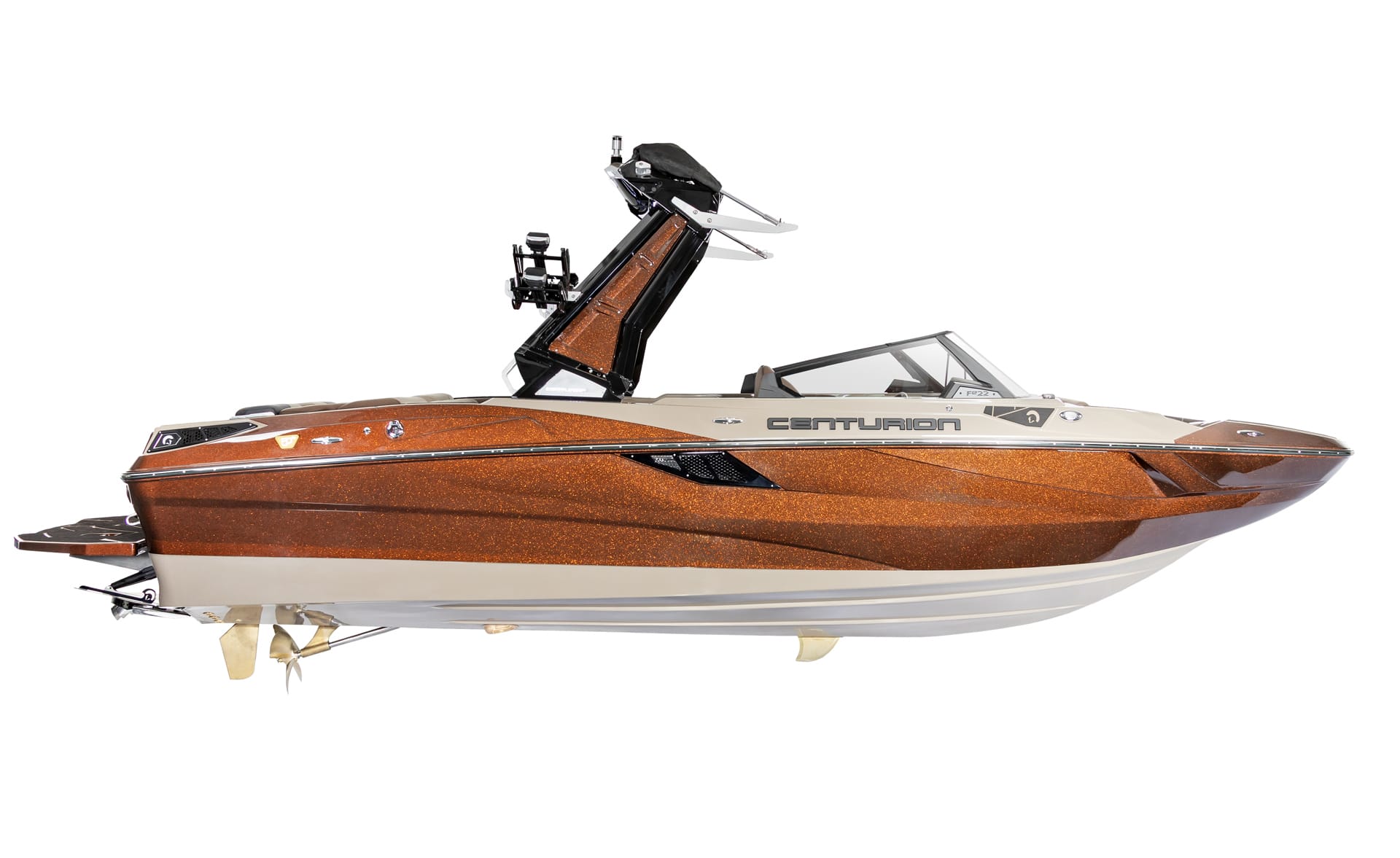 A brown and white Centurion Fi23 with a black wakeboard tower, viewed from the side on a white background.