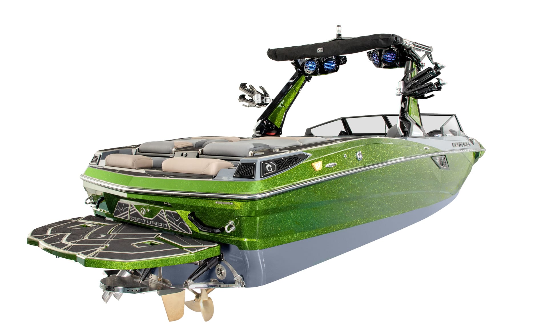 A green and gray Centurion Fi25 wakeboard boat with multiple speakers, racks for boards, and a swim platform at the rear, shown isolated on a white background.