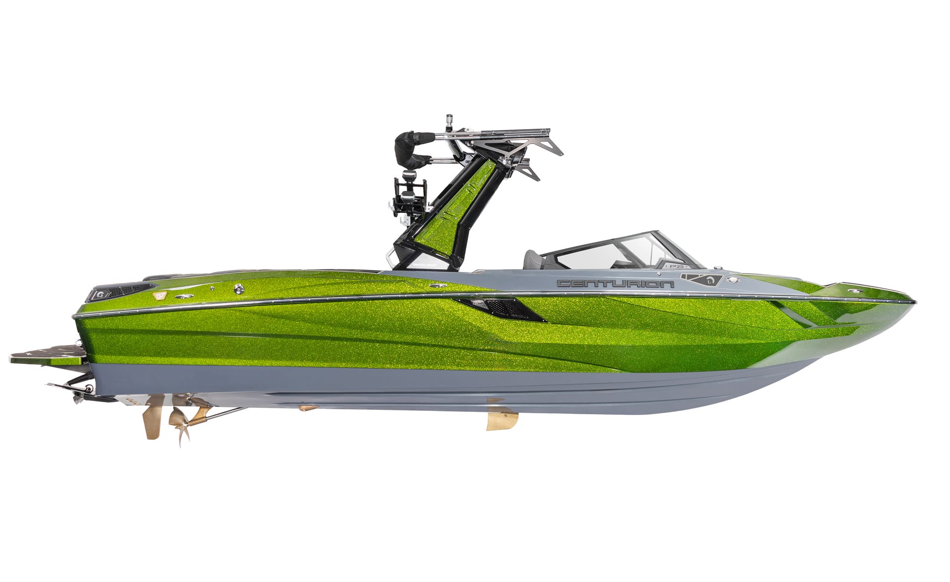 Side view of a green and gray Centurion Fi25 Wake Boat with metallic finish, wakeboard tower, and inboard motor, photographed against a white background.