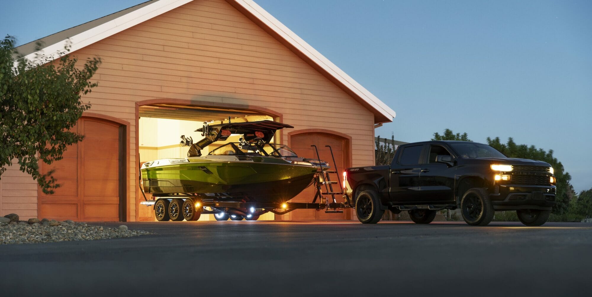 2020 Chevrolet Silverado 2500 with Silverado EPS in St. Louis, Missouri, featuring a wakeboat attachment.