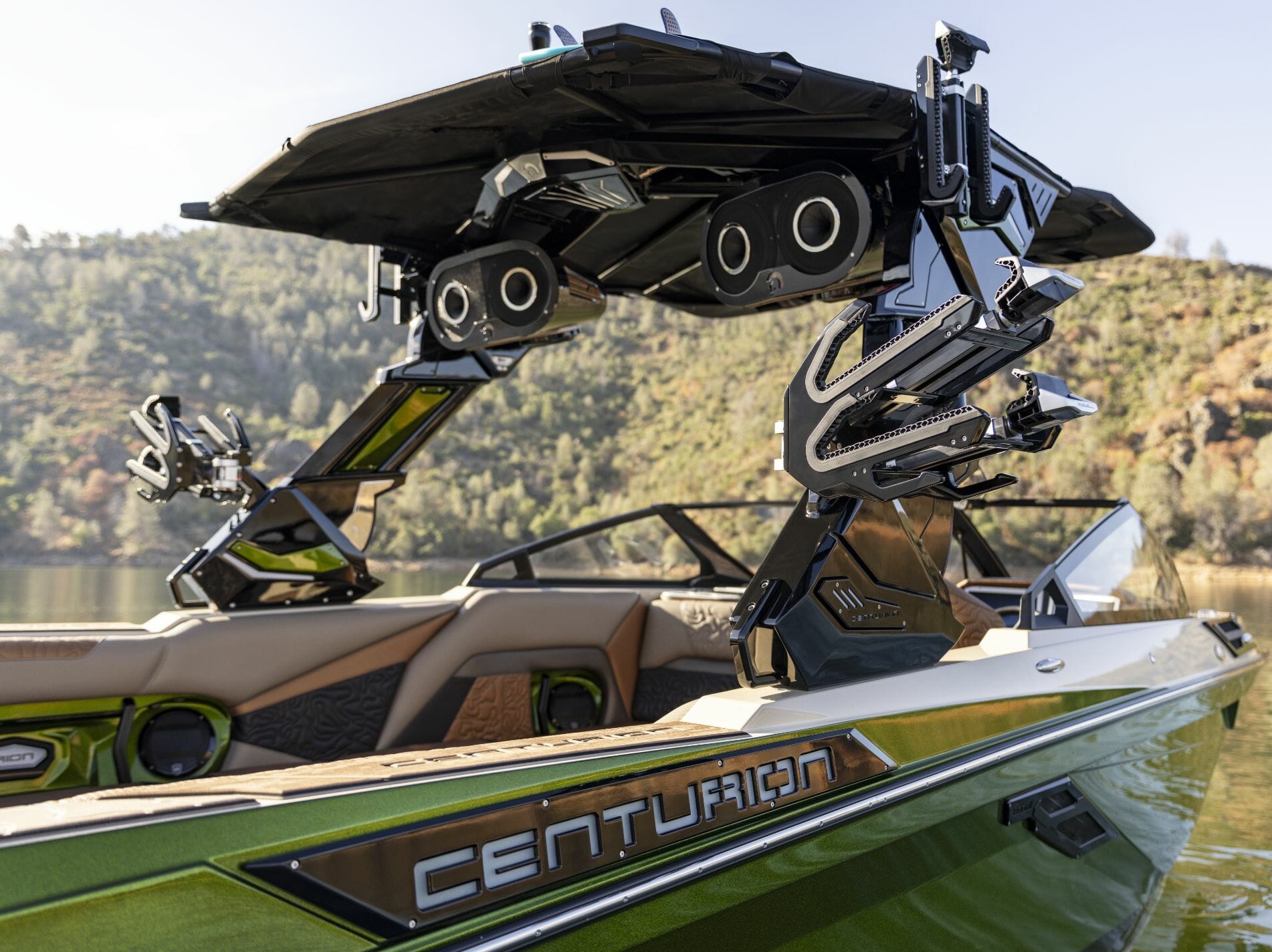 A boat with a wakesurf board on it.