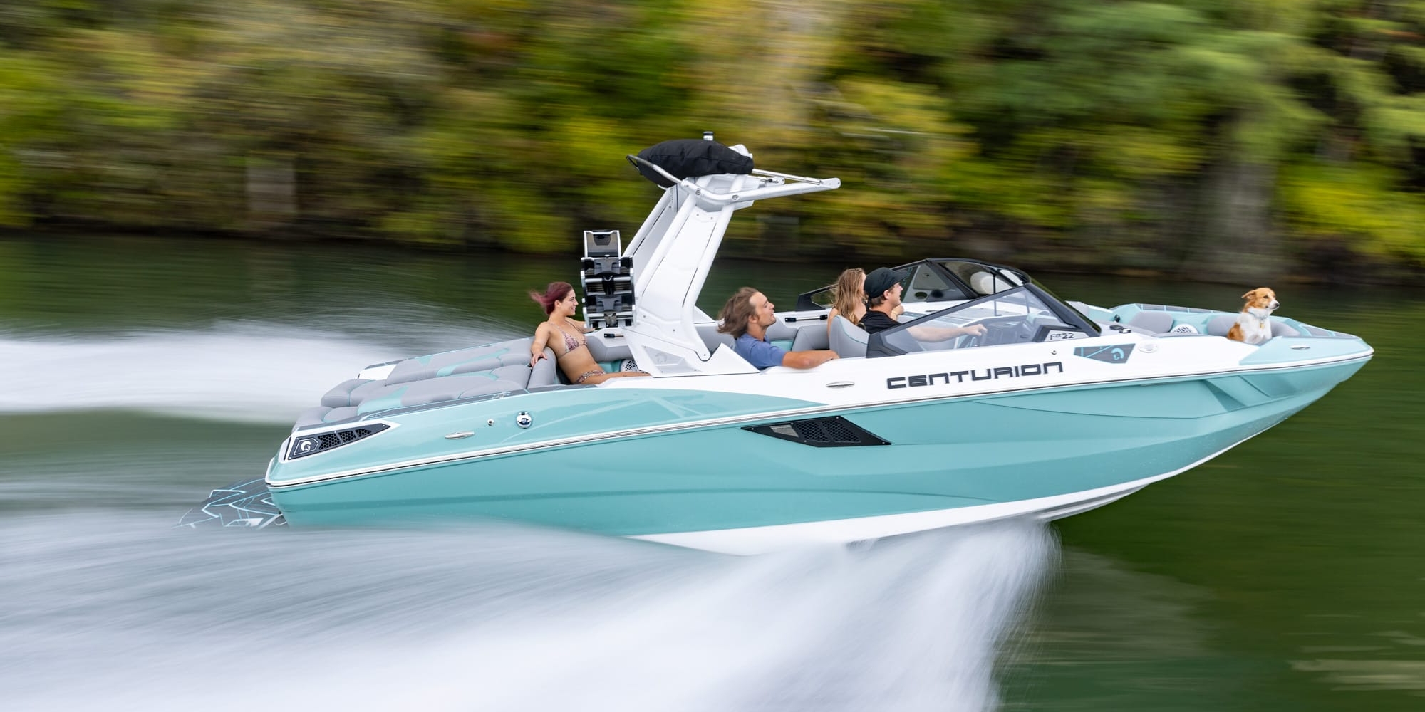 A group of people are riding a boat on the water.