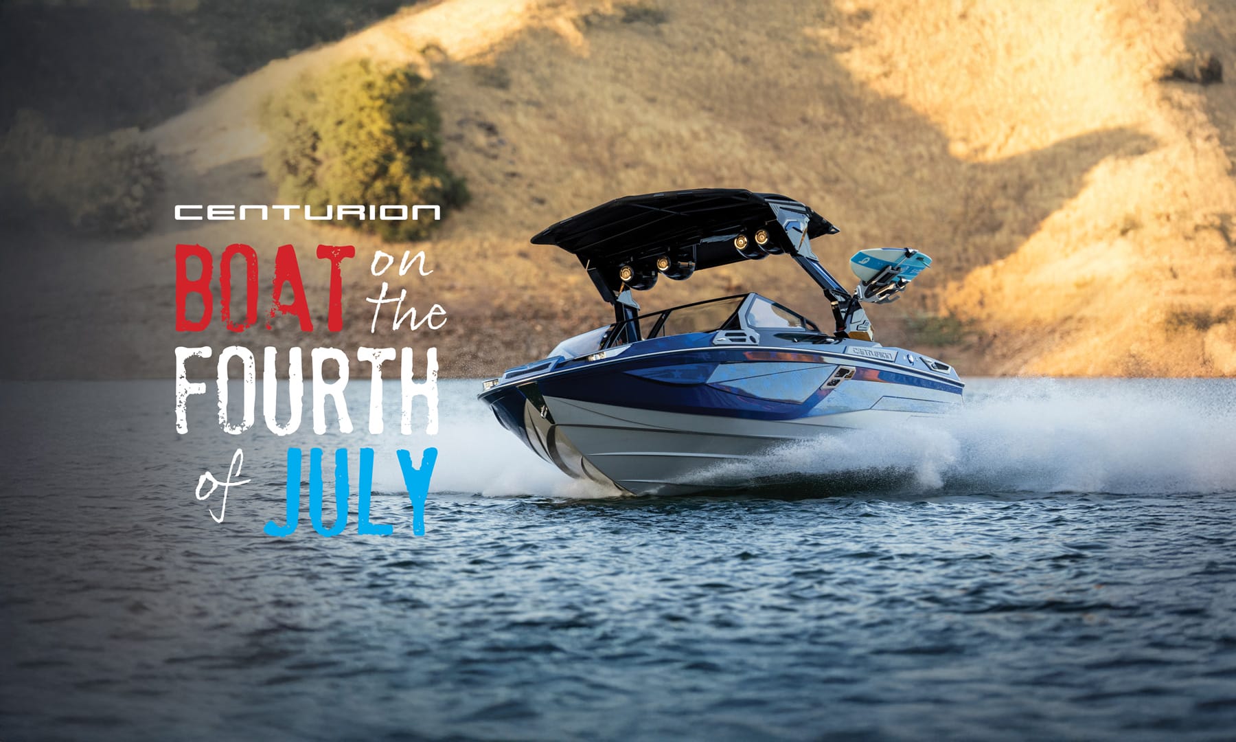 A blue and white speedboat moves quickly across a lake with hills in the background. Text reads, "CENTURION BOAT on the FOURTH of JULY.