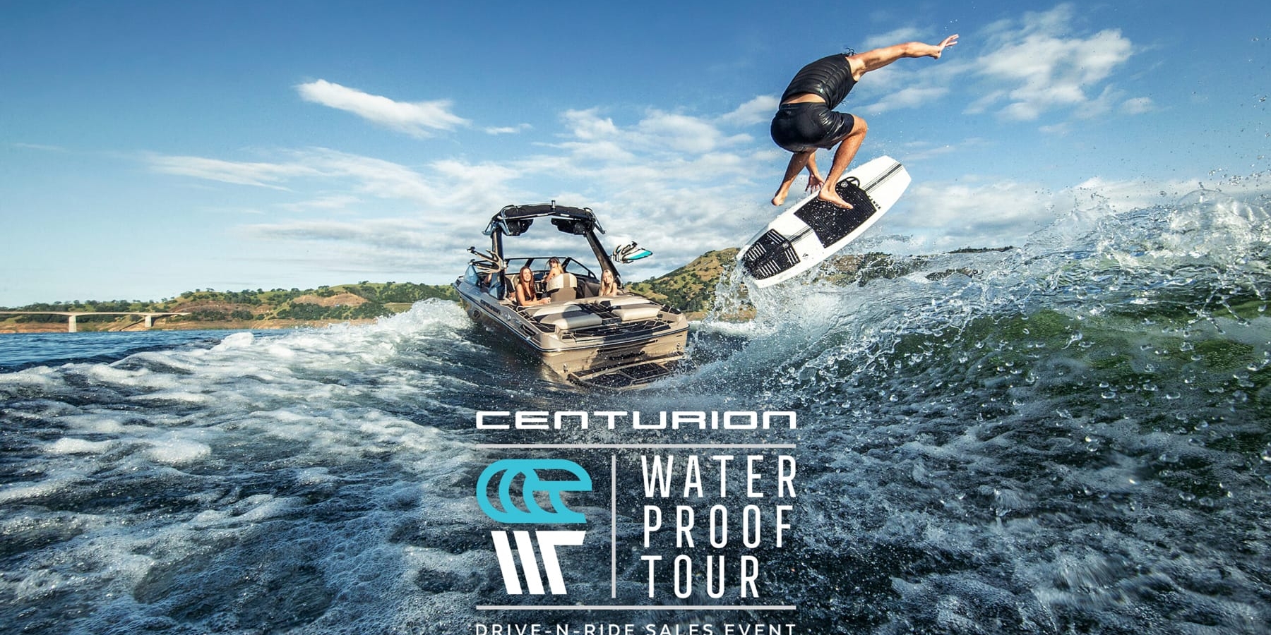 A person wakeboarding with a stylized jump next to a moving boat on a sunny day, with the 